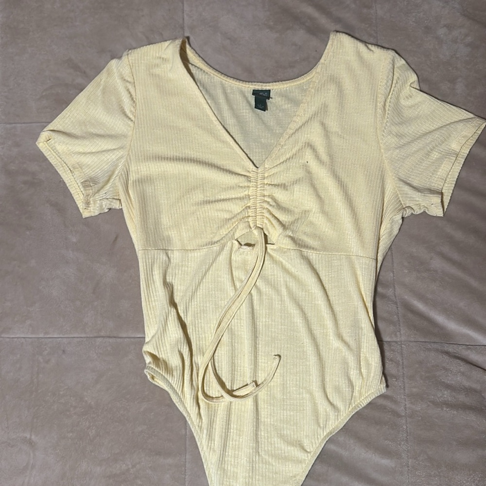 Yellow wild fable onesie
